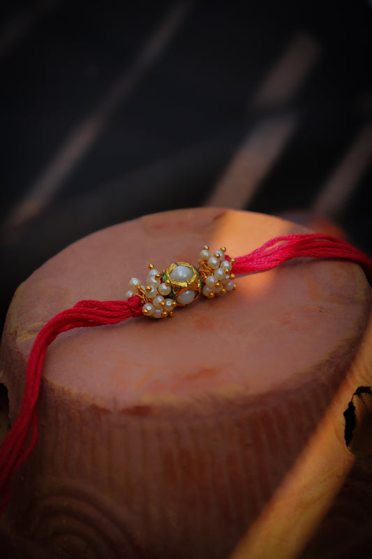 Adhamya Red Pearl Rakhi