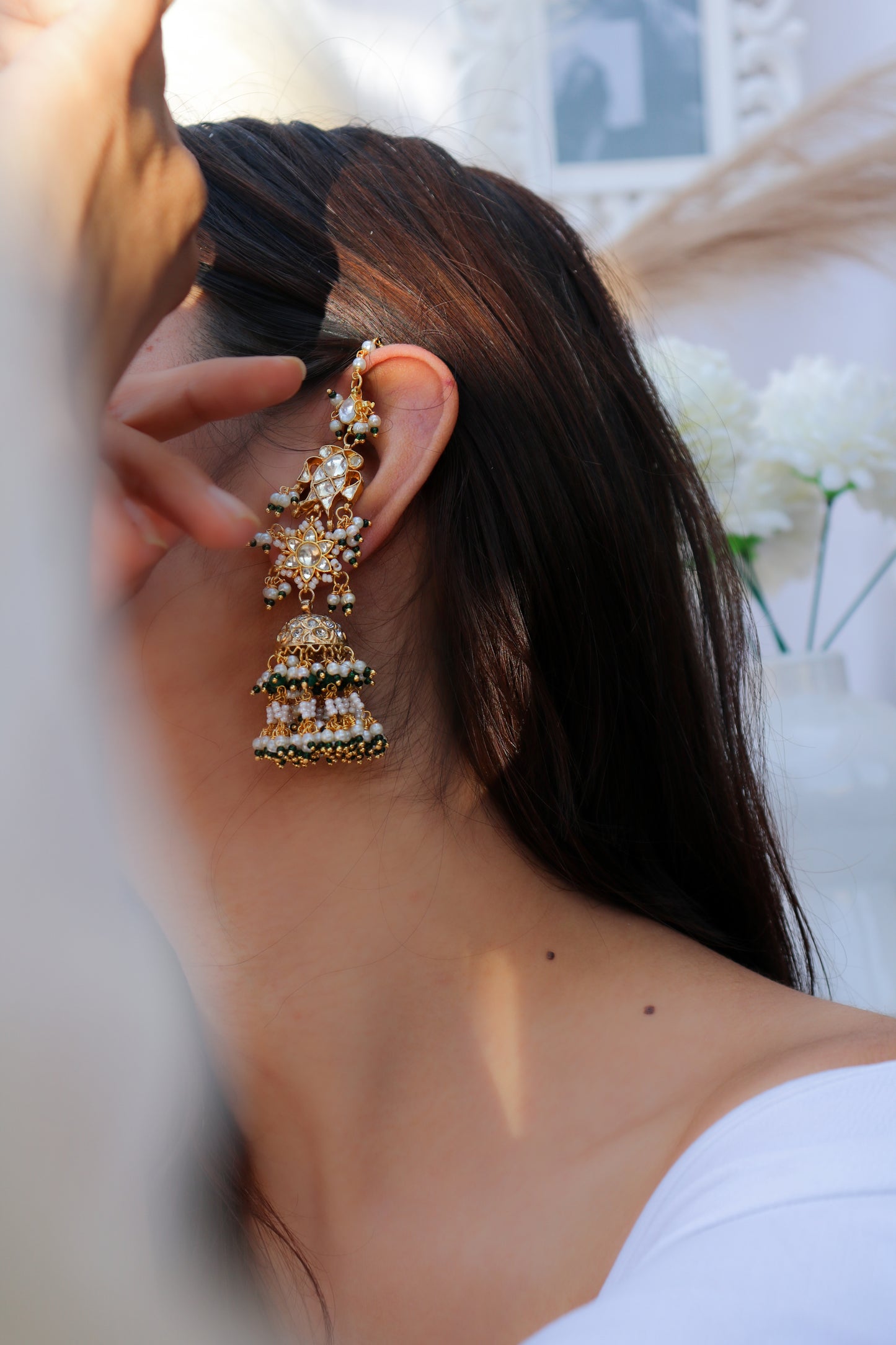 Jigsa Green Kundan Jhumka Earrings