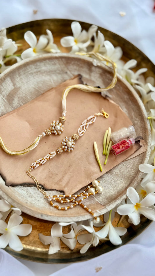 Ronav Floral Embellished Rakhi & Lumba Set